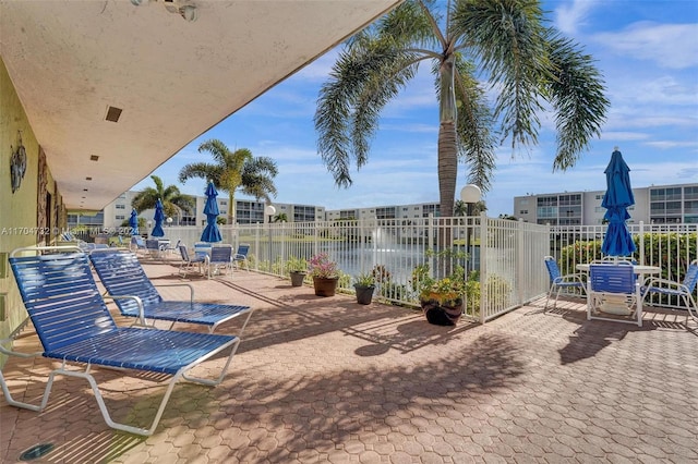 view of patio / terrace featuring a water view