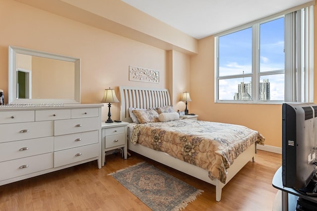 bedroom featuring light hardwood / wood-style floors