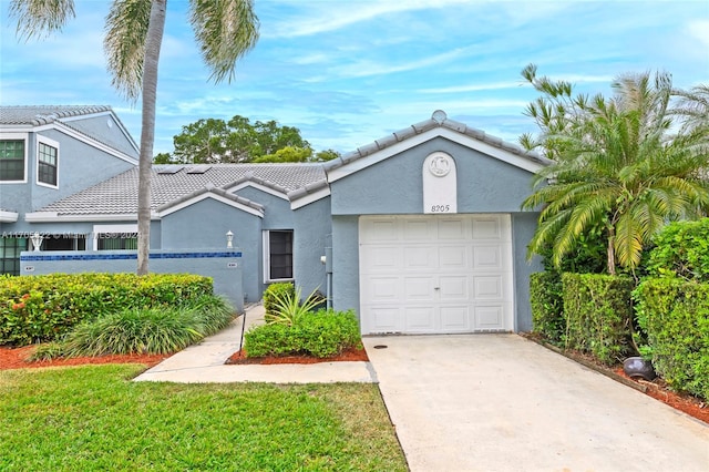 single story home featuring a garage