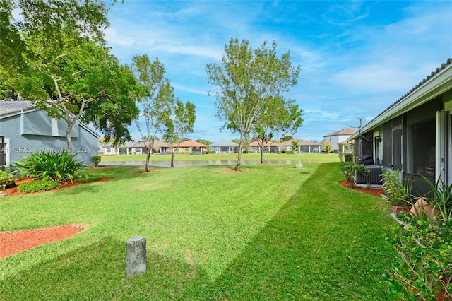 view of yard with a water view