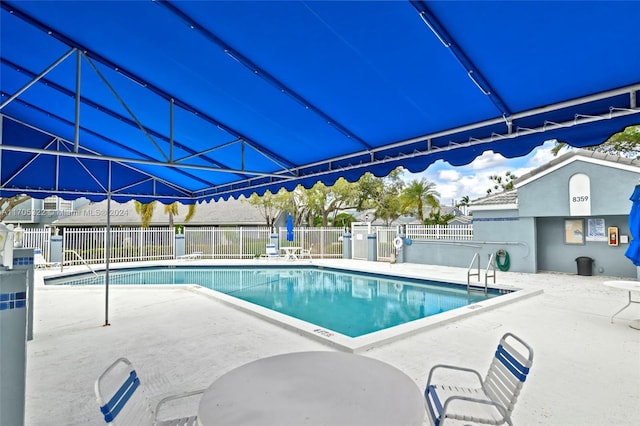 view of pool with a patio