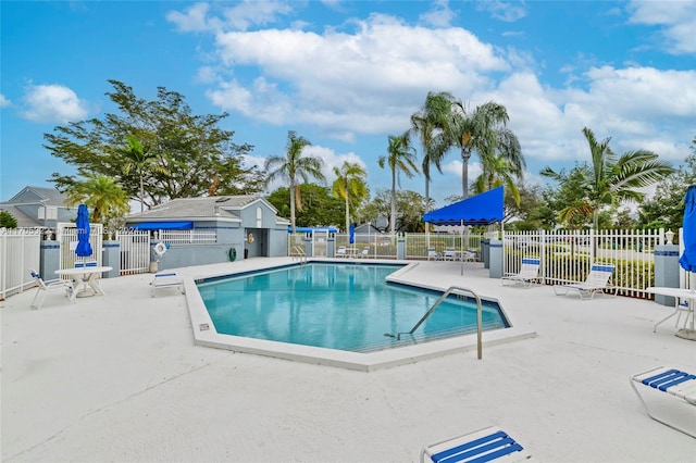 view of swimming pool featuring a patio