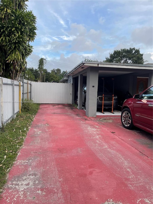 exterior space featuring a carport