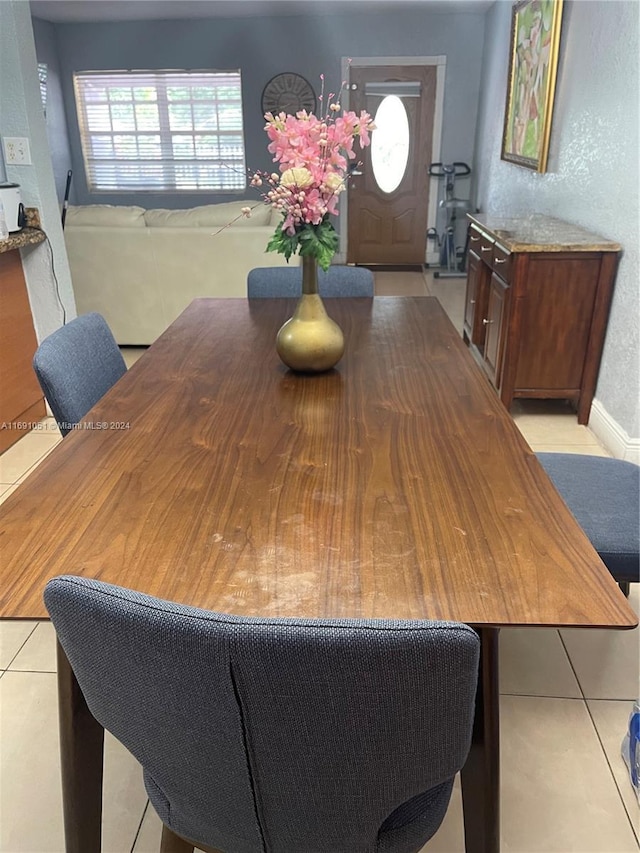 view of tiled dining space