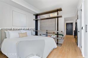 bedroom featuring light hardwood / wood-style floors