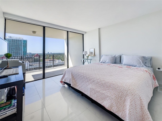 tiled bedroom with access to outside and expansive windows