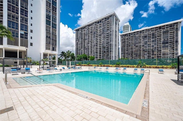 view of pool featuring a patio area