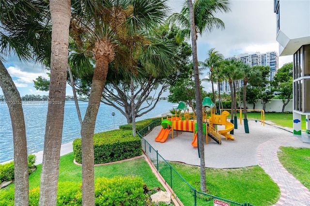 view of jungle gym featuring a water view