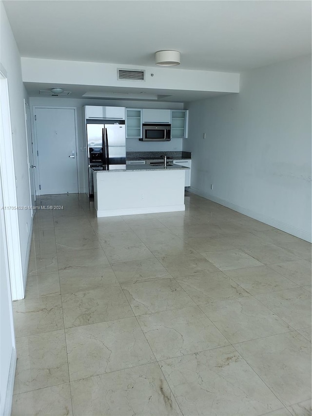 kitchen with sink and appliances with stainless steel finishes