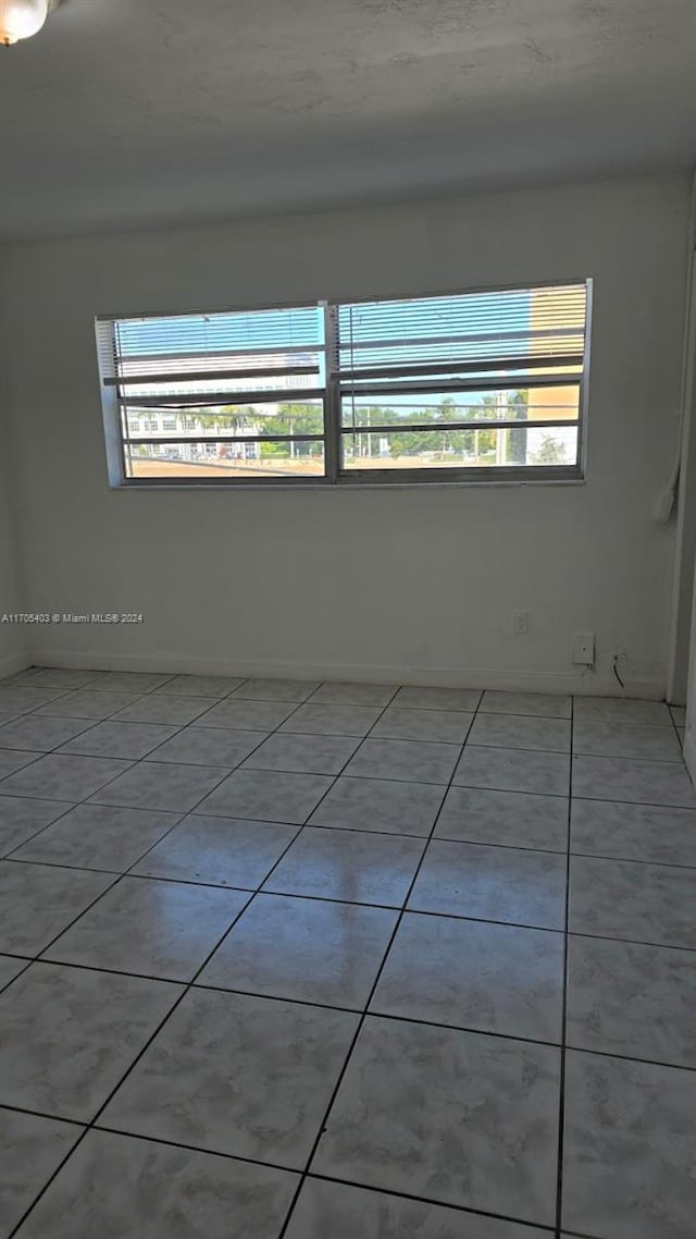 view of tiled empty room