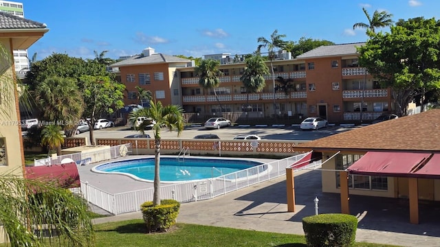 view of swimming pool featuring a patio area