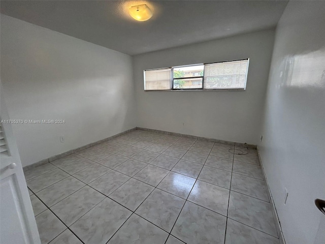 view of tiled empty room