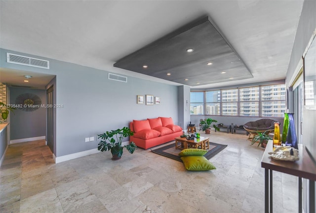 interior space with a tray ceiling