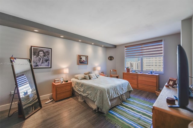 bedroom featuring dark wood-type flooring