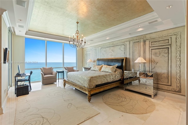 bedroom featuring floor to ceiling windows, a tray ceiling, crown molding, a water view, and a chandelier