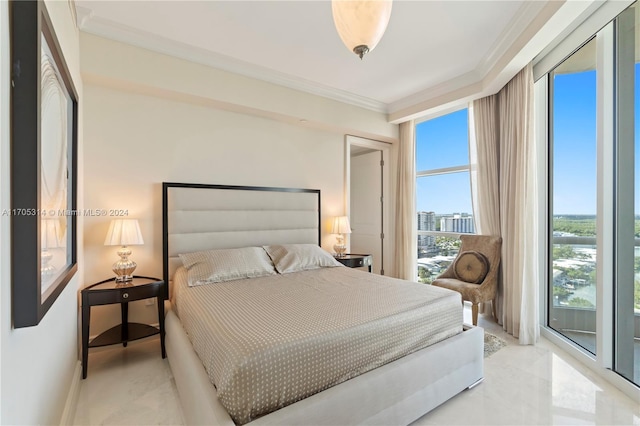 bedroom featuring access to exterior and crown molding