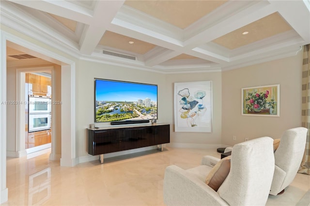 home theater featuring beam ceiling, ornamental molding, and coffered ceiling