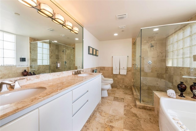 full bathroom with a bidet, plenty of natural light, plus walk in shower, and tile walls