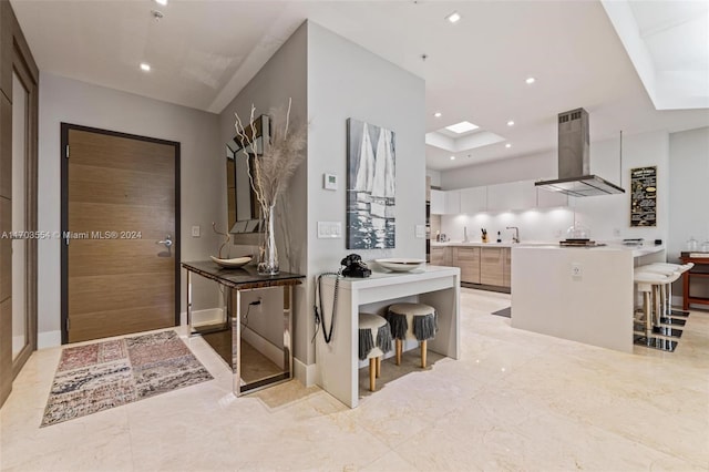 foyer with a skylight