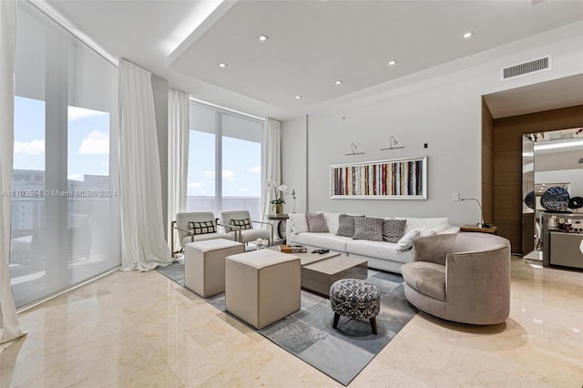 living room featuring a water view