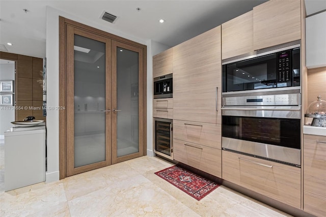 kitchen with wine cooler, decorative backsplash, french doors, and appliances with stainless steel finishes