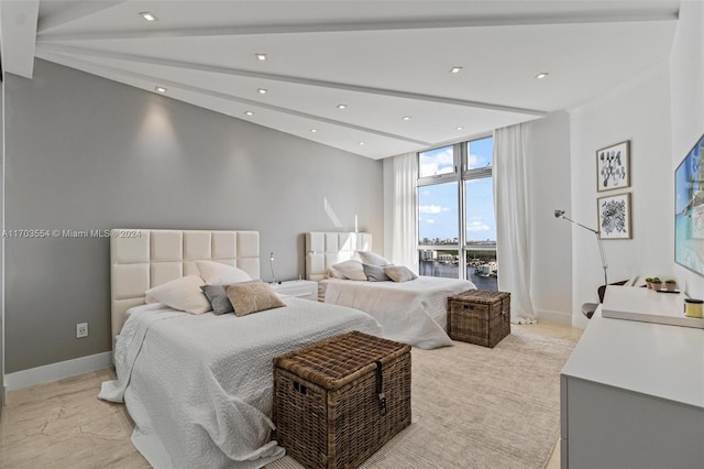 bedroom featuring vaulted ceiling