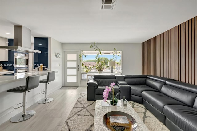 living room featuring light wood-type flooring