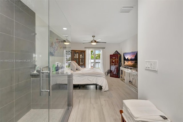 bedroom with hardwood / wood-style floors and ceiling fan