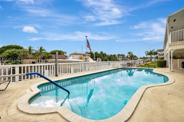 view of pool with a patio