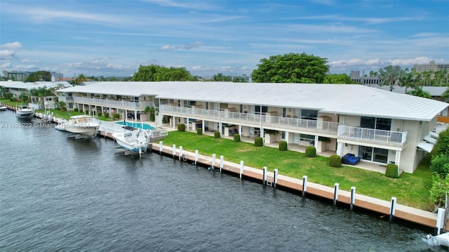 drone / aerial view with a water view