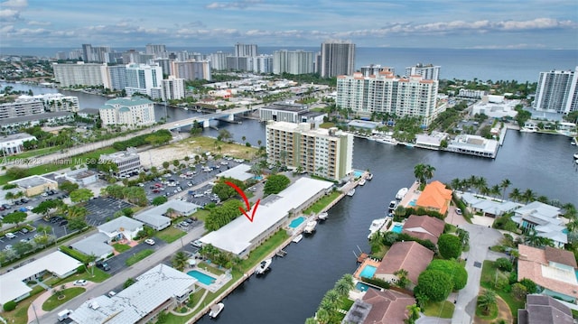 drone / aerial view featuring a water view