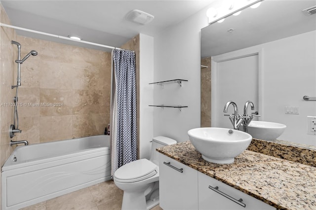 full bathroom with vanity, tile patterned flooring, shower / bathtub combination with curtain, and toilet