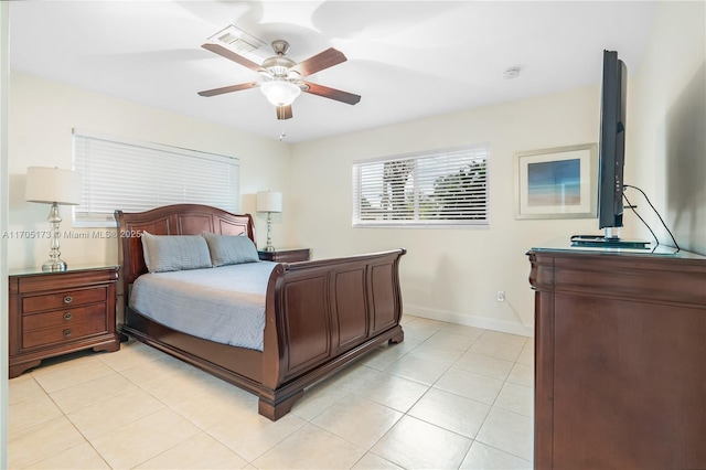 bedroom featuring ceiling fan and light tile patterned floors