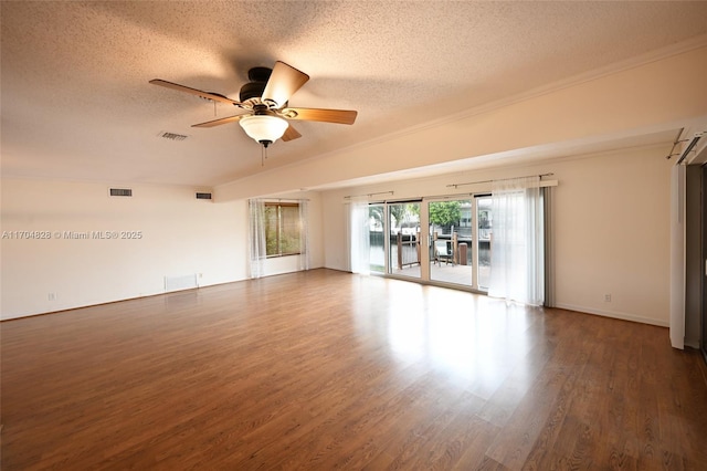 unfurnished room with hardwood / wood-style flooring, a textured ceiling, and ceiling fan