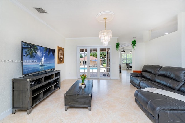 tiled living room featuring french doors, ornamental molding, and a chandelier