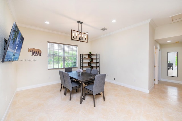 dining space with crown molding and an inviting chandelier