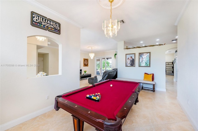 game room with billiards, ornamental molding, and light tile patterned floors