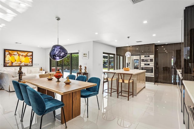 view of tiled dining space