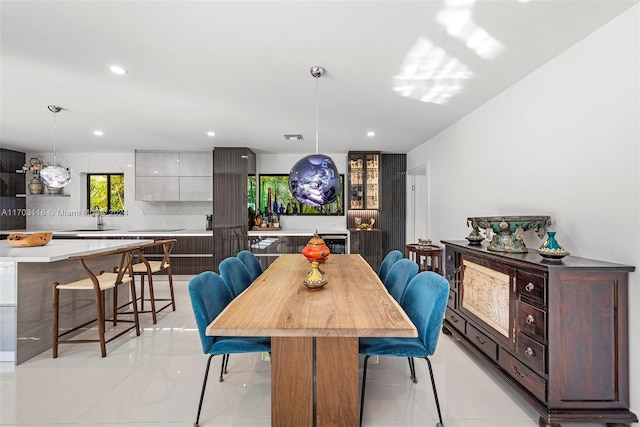 dining space with sink