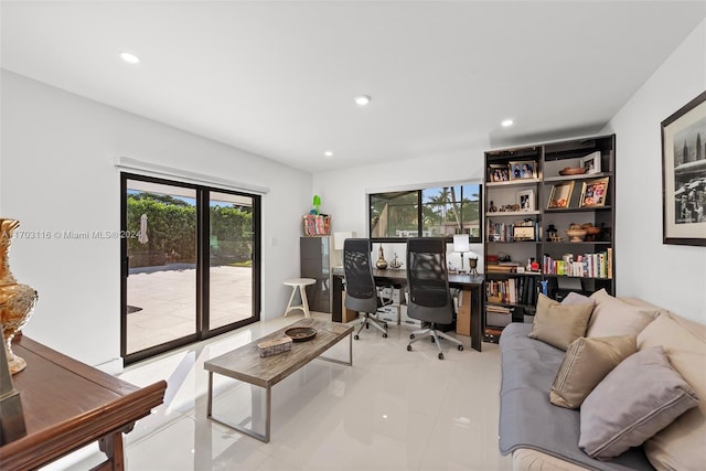 home office with light tile patterned flooring