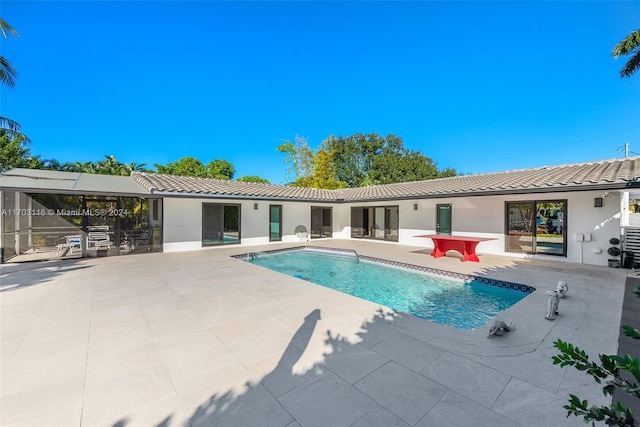 view of pool featuring a patio