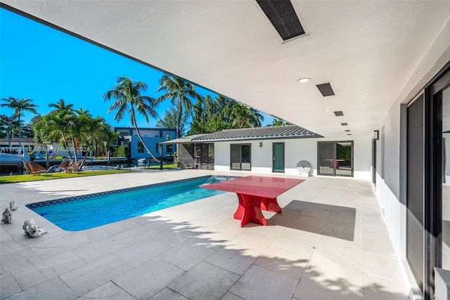 view of pool with a patio area