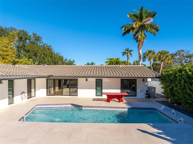 back of house featuring a patio