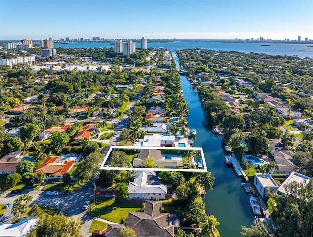 drone / aerial view with a water view