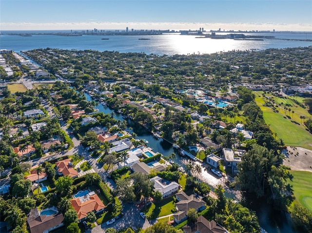 bird's eye view with a water view