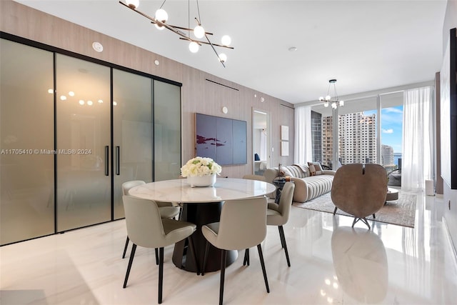 dining space featuring an inviting chandelier