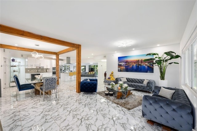 living room with beamed ceiling