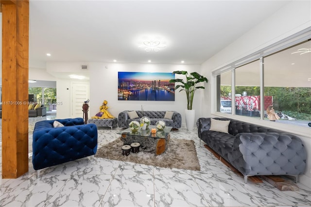 living room featuring plenty of natural light