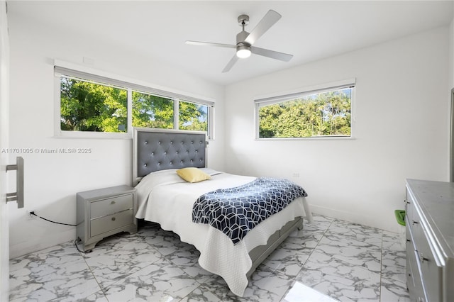 bedroom featuring ceiling fan