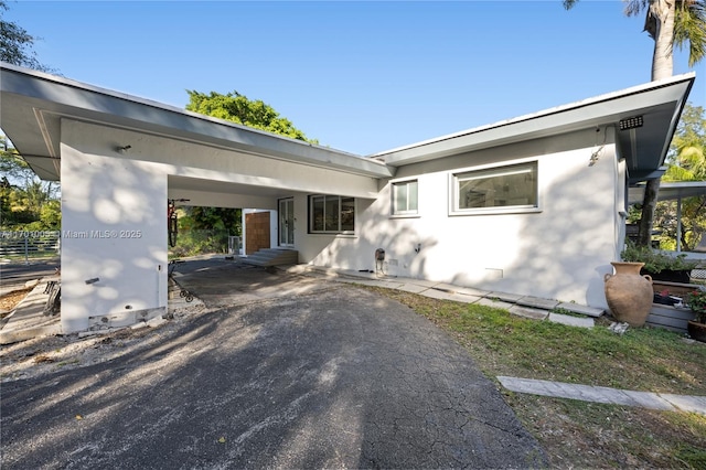 view of front of house with a carport